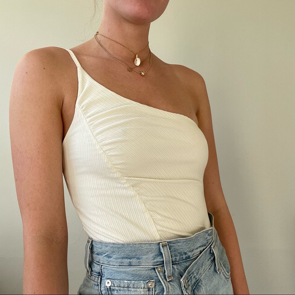 white one shoulder bodysuit
